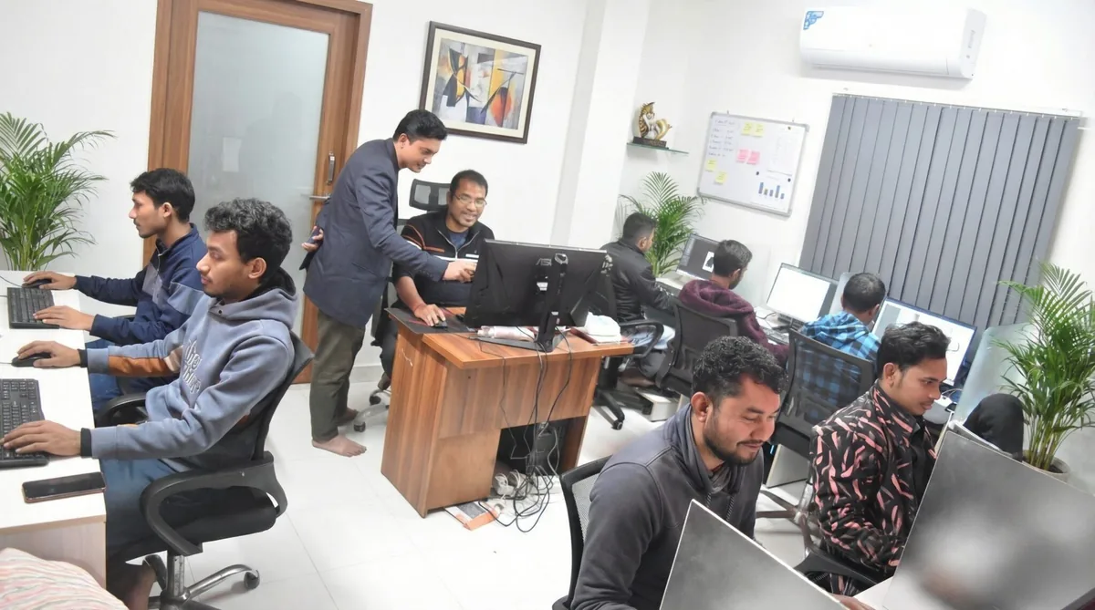 FixAnyPhoto QC team working on photo editing projects
